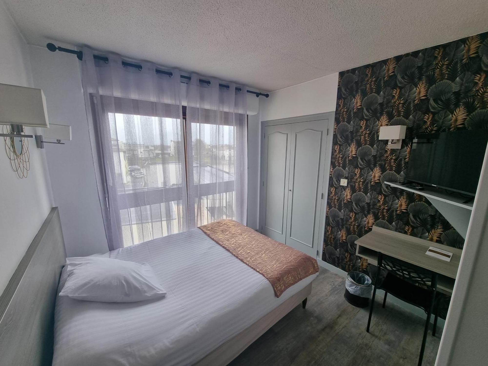 Hotel Le Vascon Dax Bagian luar foto