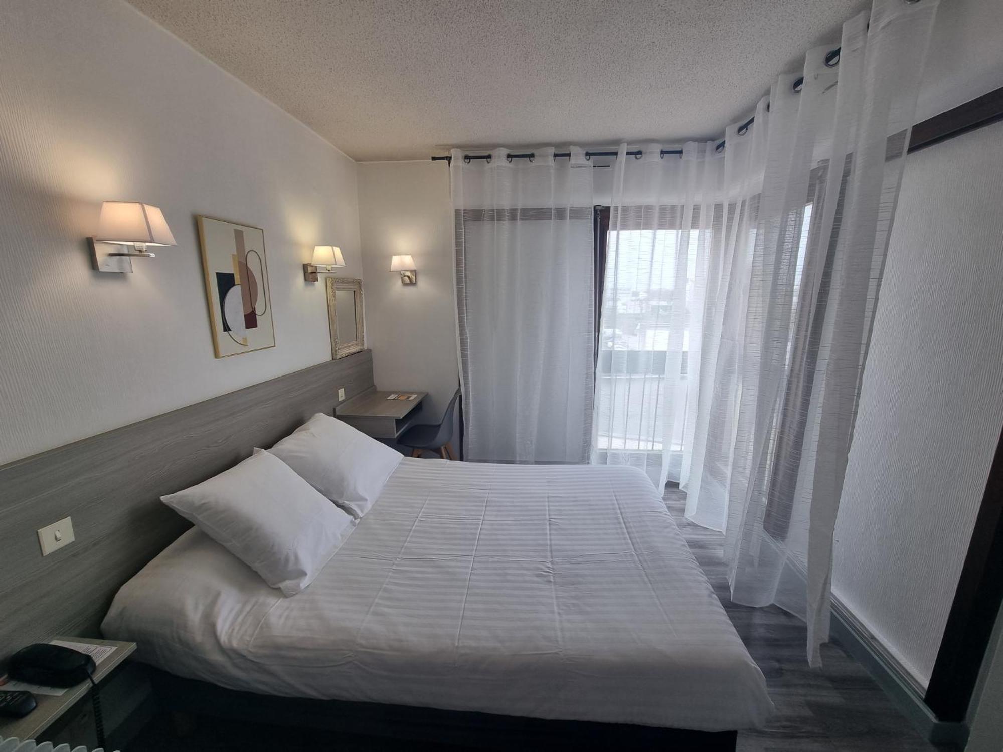 Hotel Le Vascon Dax Bagian luar foto