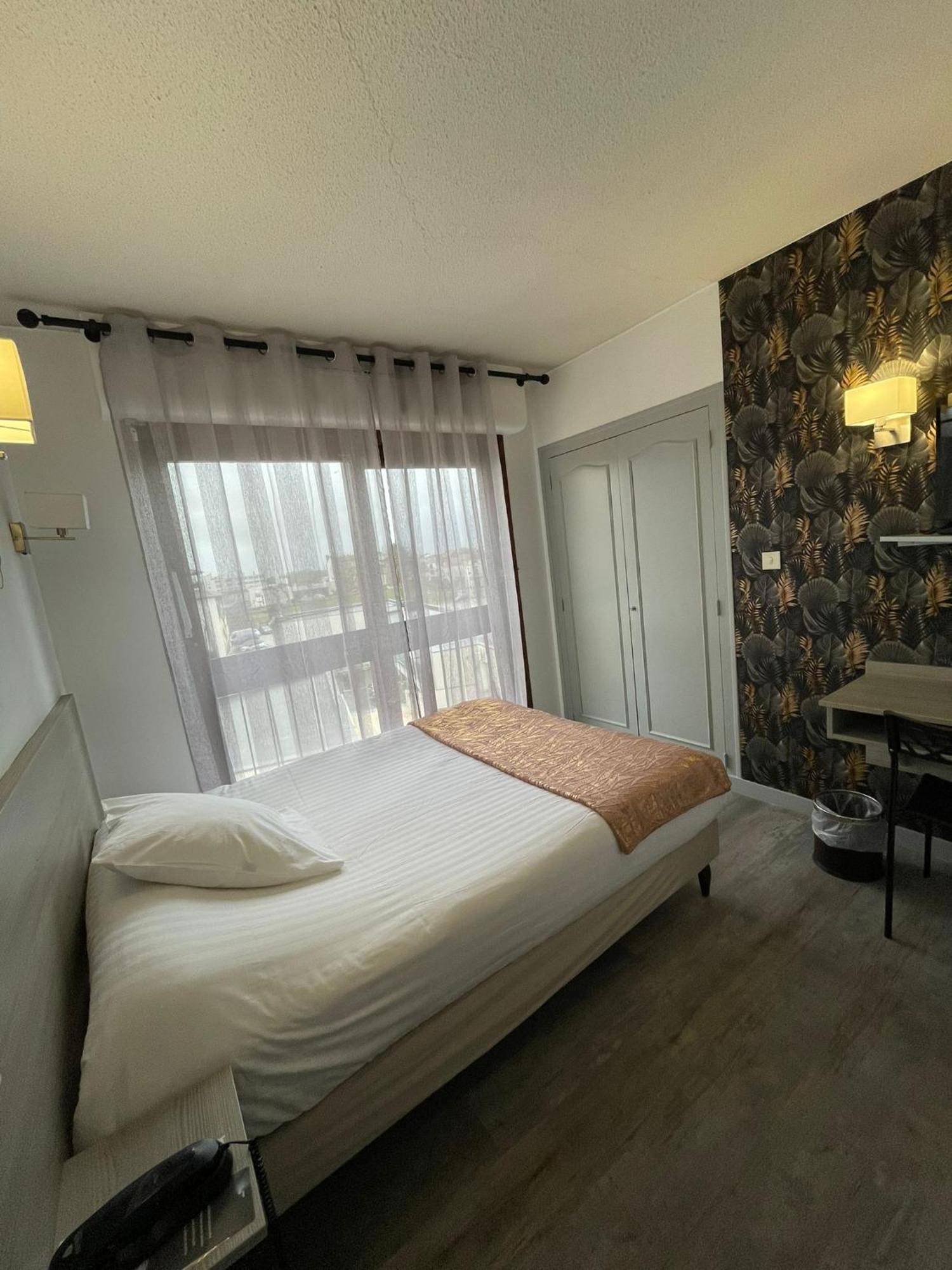 Hotel Le Vascon Dax Bagian luar foto